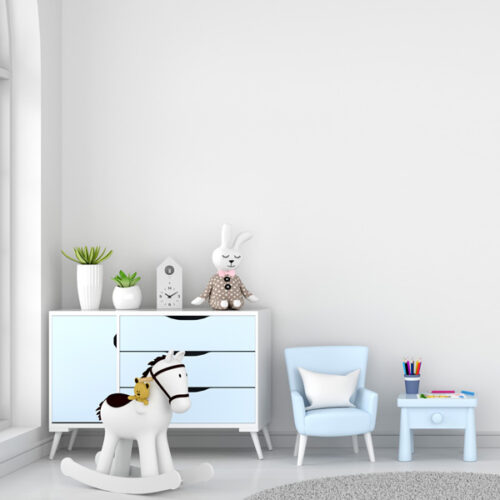table-and-armchair-in-white-child-room-interior-with-copy-space